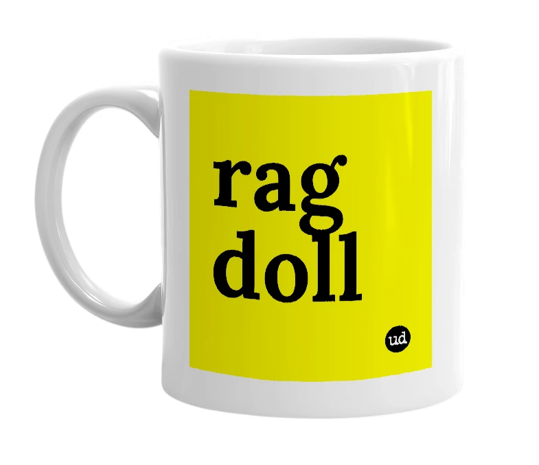 White mug with 'rag doll' in bold black letters