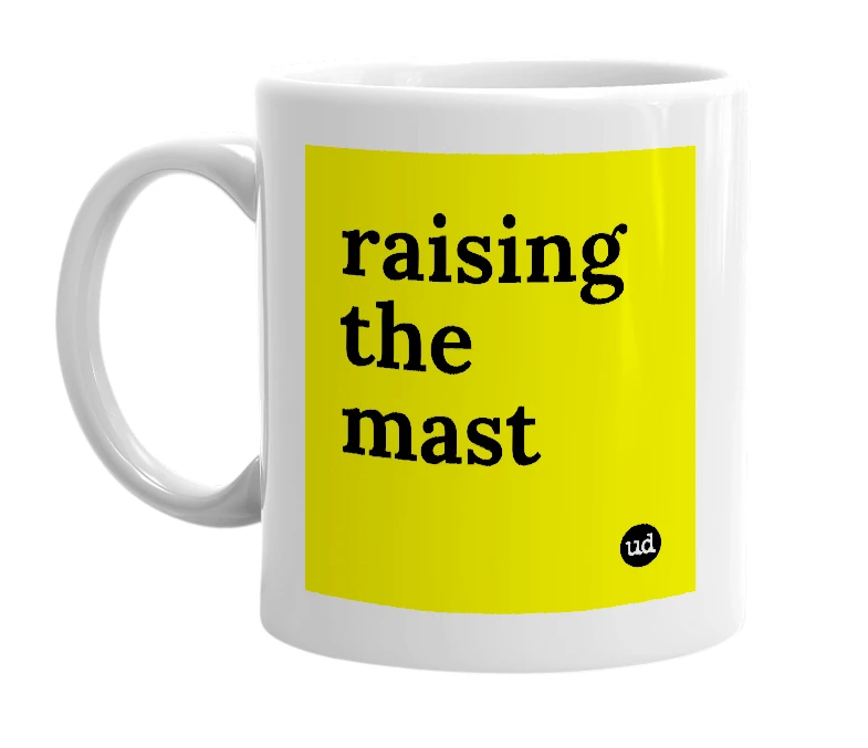 White mug with 'raising the mast' in bold black letters