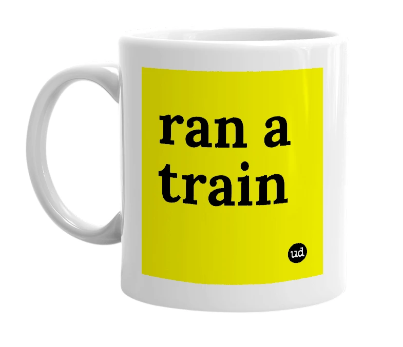 White mug with 'ran a train' in bold black letters