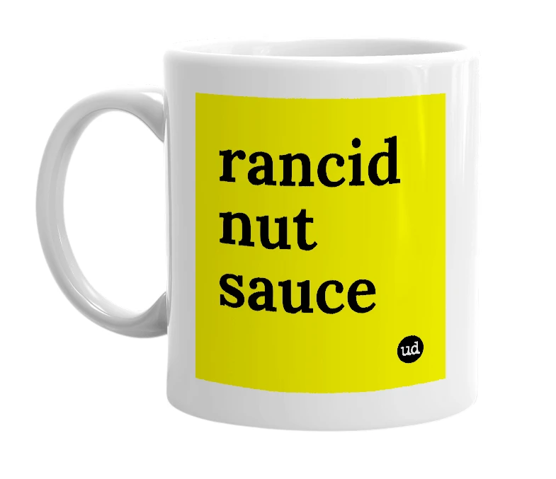 White mug with 'rancid nut sauce' in bold black letters