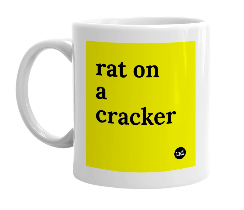 White mug with 'rat on a cracker' in bold black letters