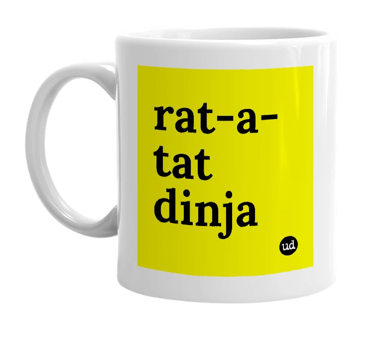 White mug with 'rat-a-tat dinja' in bold black letters
