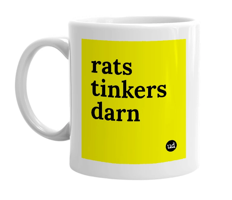 White mug with 'rats tinkers darn' in bold black letters