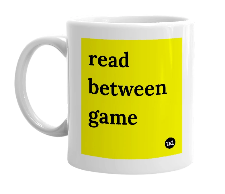 White mug with 'read between game' in bold black letters