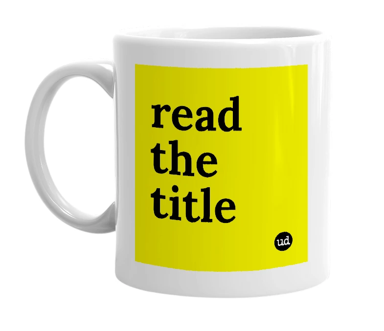 White mug with 'read the title' in bold black letters