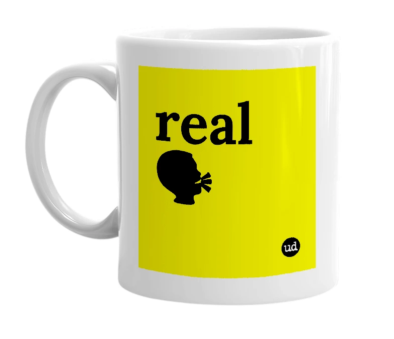 White mug with 'real🗣' in bold black letters