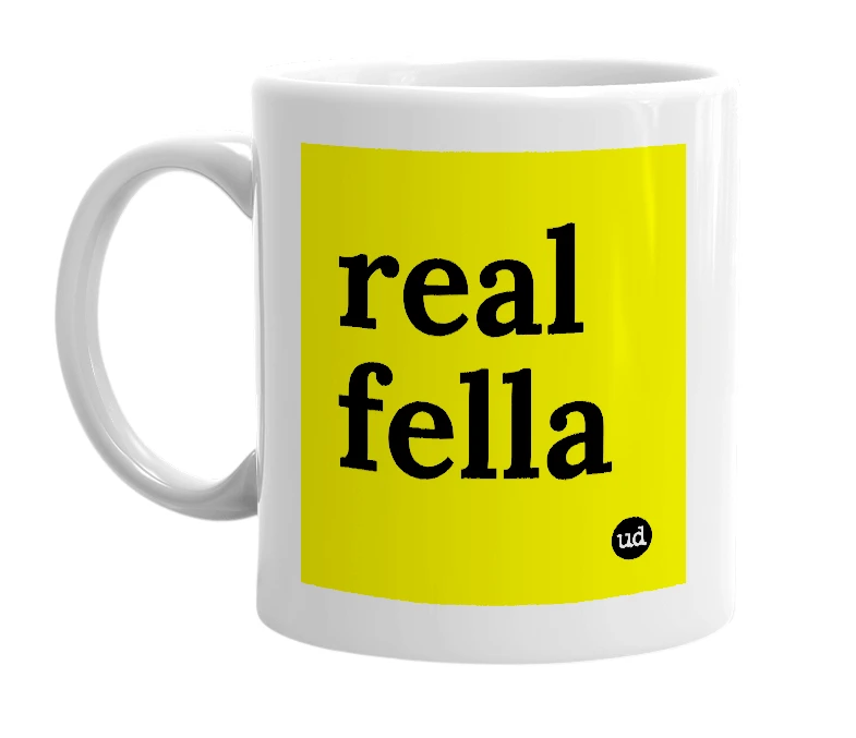 White mug with 'real fella' in bold black letters