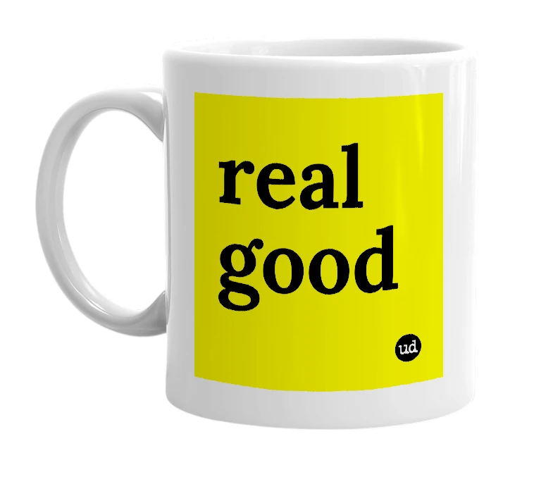 White mug with 'real good' in bold black letters