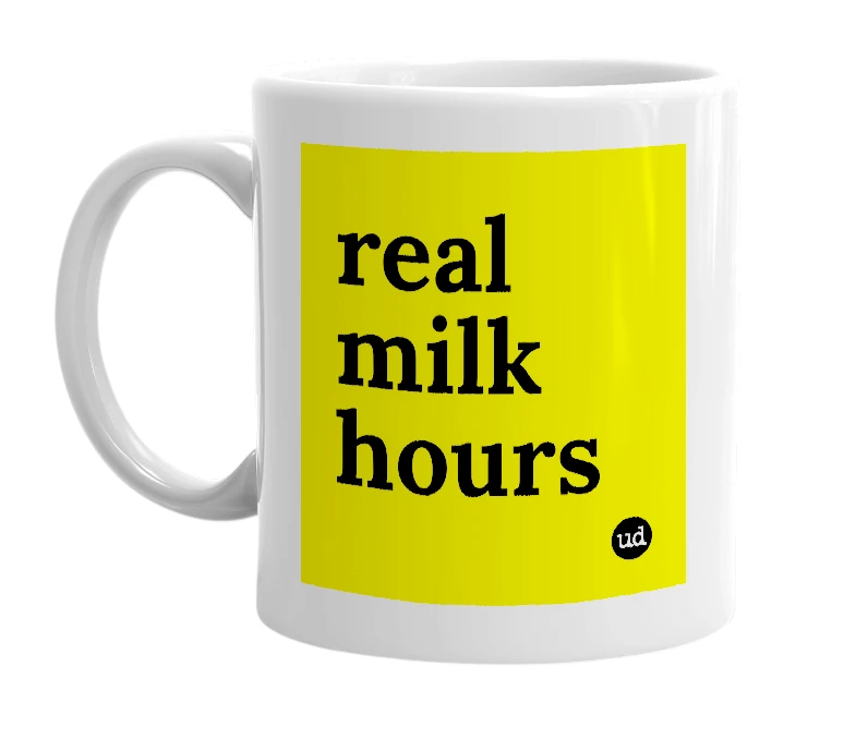 White mug with 'real milk hours' in bold black letters