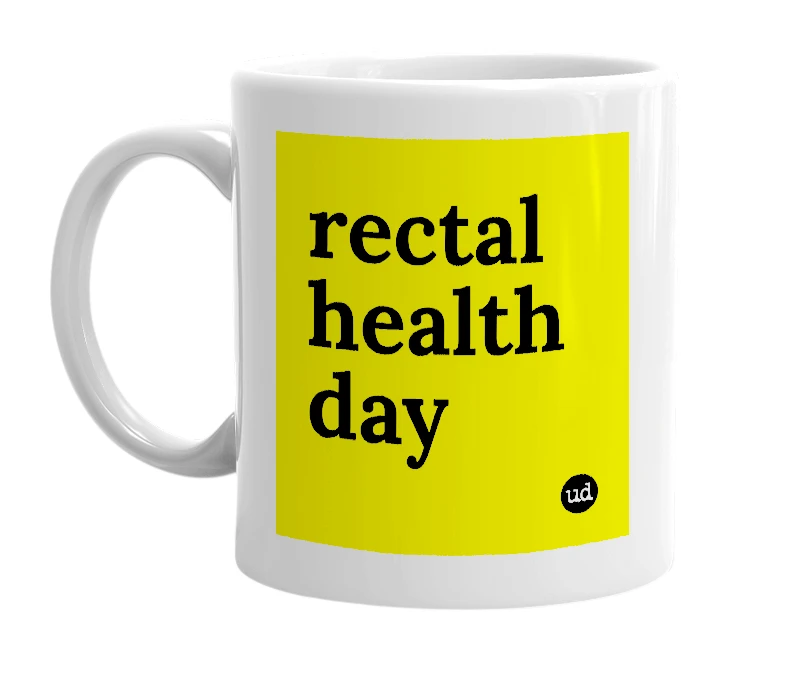 White mug with 'rectal health day' in bold black letters