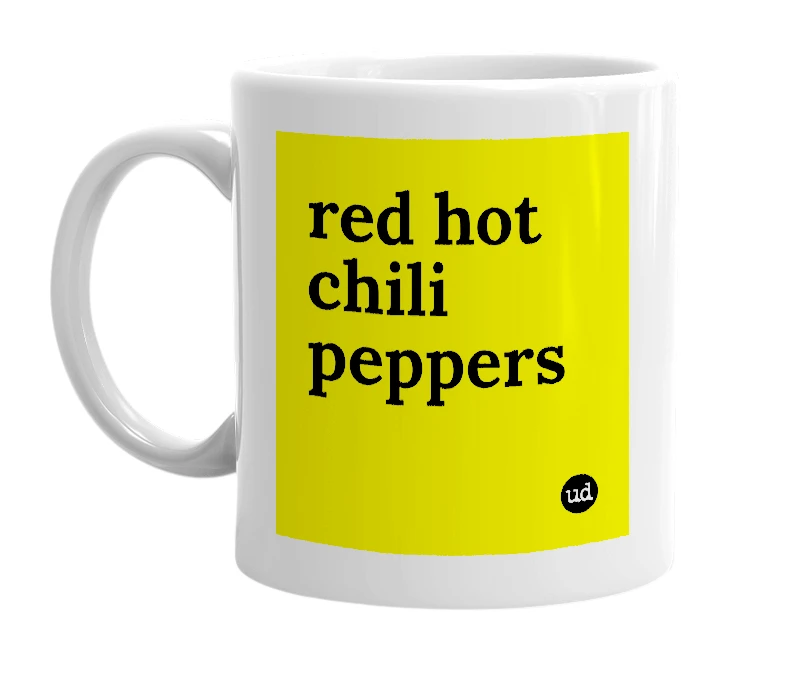 White mug with 'red hot chili peppers' in bold black letters