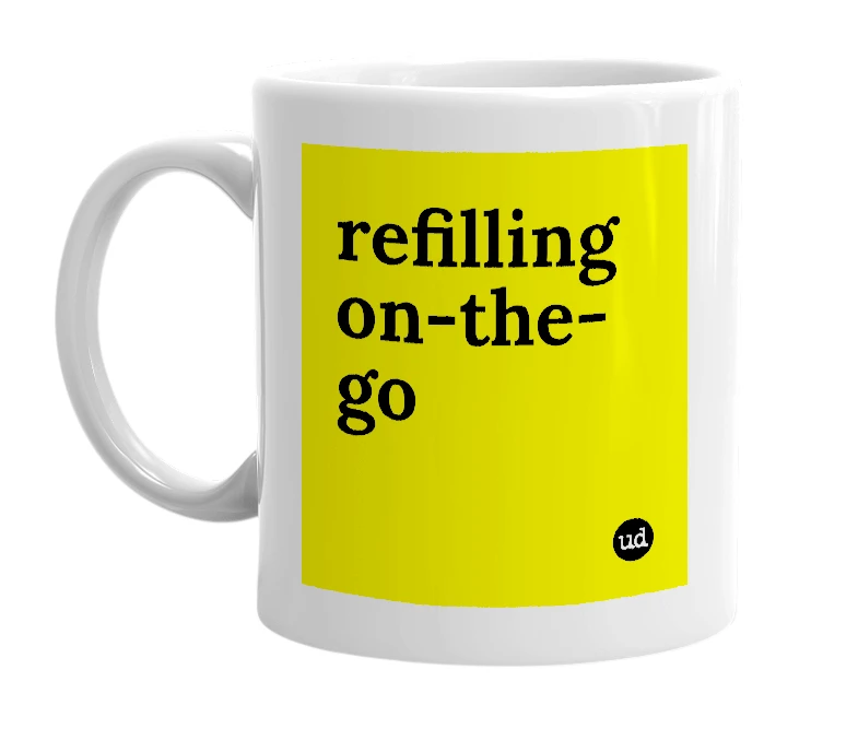 White mug with 'refilling on-the-go' in bold black letters