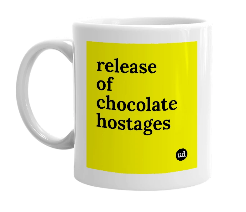 White mug with 'release of chocolate hostages' in bold black letters