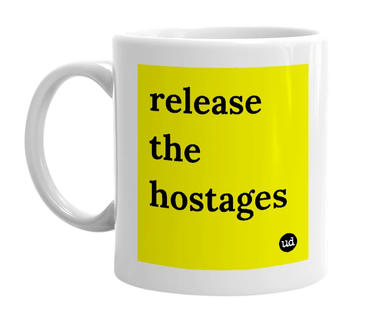 White mug with 'release the hostages' in bold black letters