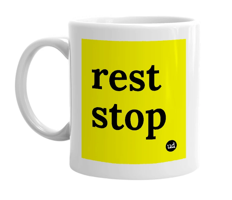 White mug with 'rest stop' in bold black letters