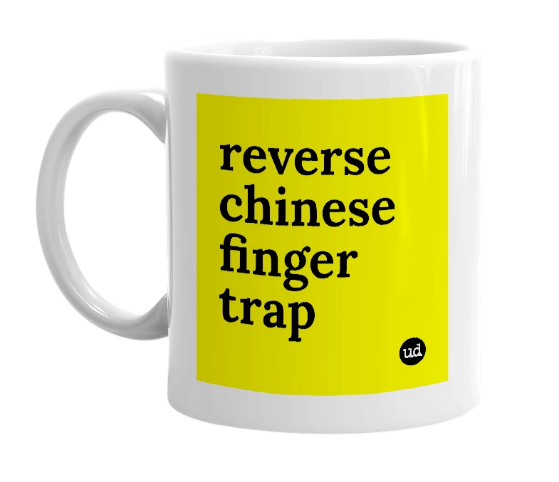 White mug with 'reverse chinese finger trap' in bold black letters
