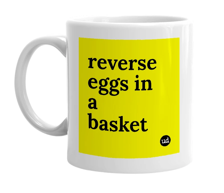 White mug with 'reverse eggs in a basket' in bold black letters