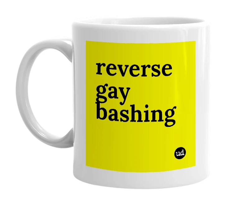 White mug with 'reverse gay bashing' in bold black letters