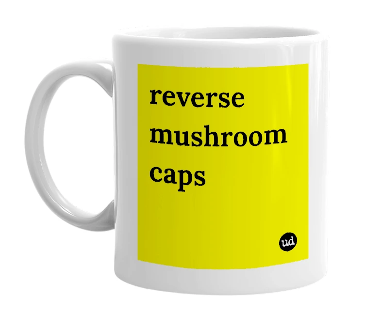 White mug with 'reverse mushroom caps' in bold black letters