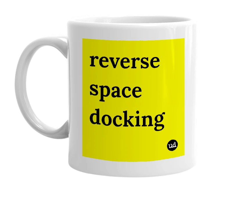 White mug with 'reverse space docking' in bold black letters
