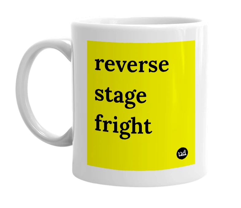 White mug with 'reverse stage fright' in bold black letters