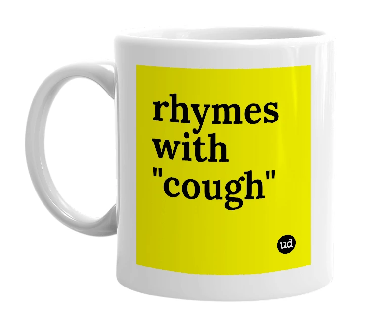 White mug with 'rhymes with "cough"' in bold black letters