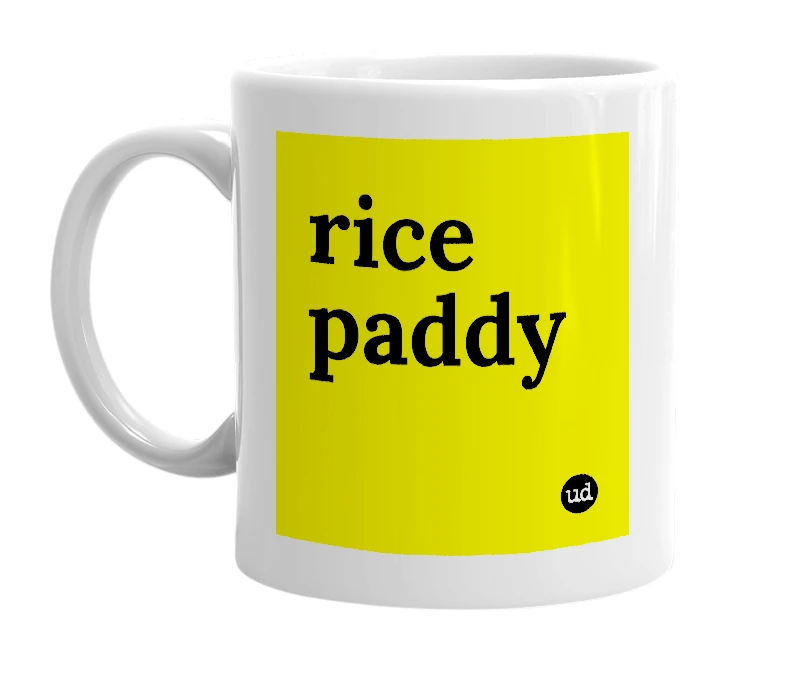 White mug with 'rice paddy' in bold black letters