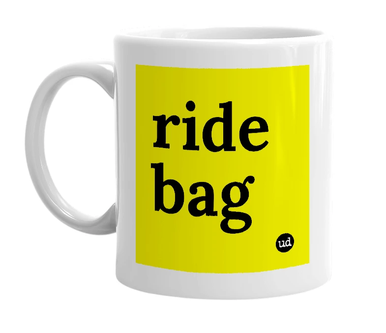 White mug with 'ride bag' in bold black letters