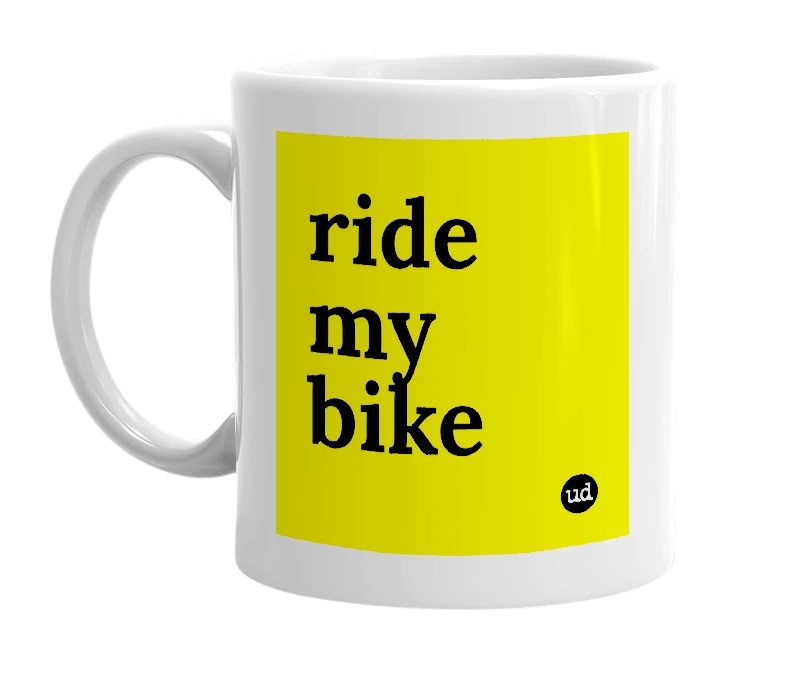 White mug with 'ride my bike' in bold black letters