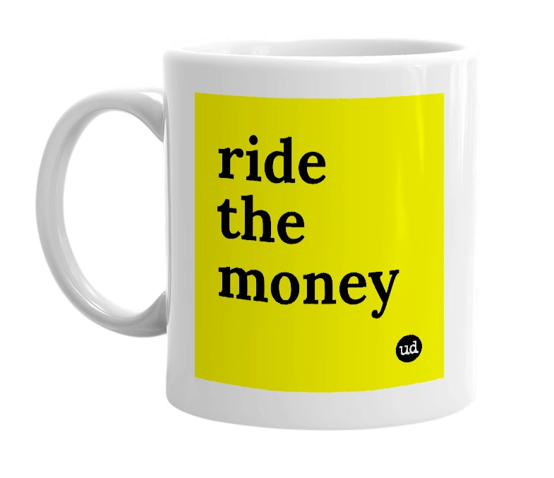 White mug with 'ride the money' in bold black letters