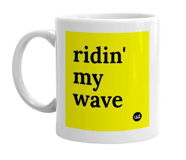 White mug with 'ridin' my wave' in bold black letters