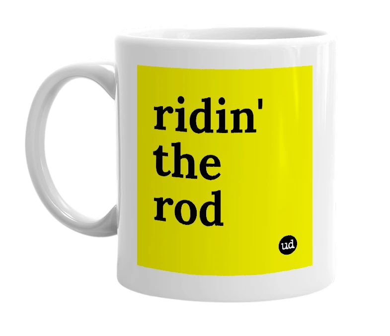 White mug with 'ridin' the rod' in bold black letters