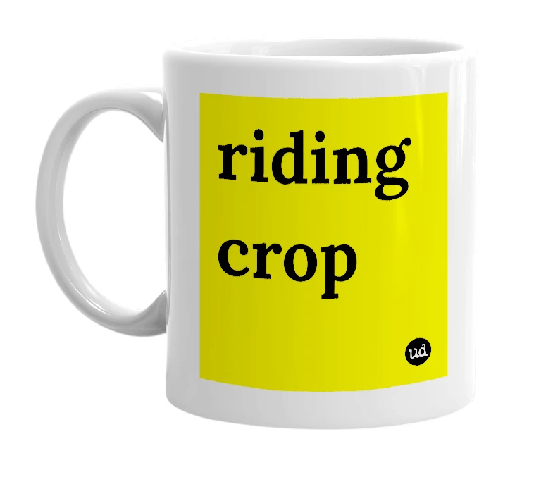 White mug with 'riding crop' in bold black letters