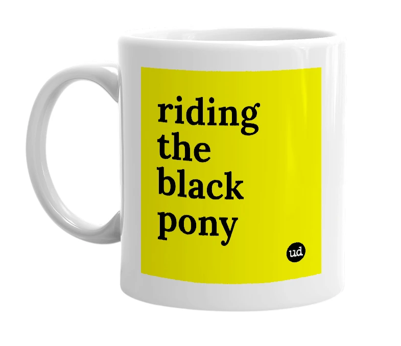 White mug with 'riding the black pony' in bold black letters