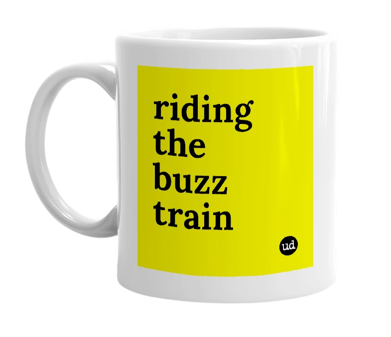 White mug with 'riding the buzz train' in bold black letters
