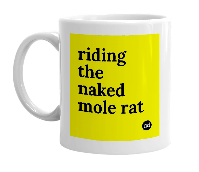 White mug with 'riding the naked mole rat' in bold black letters