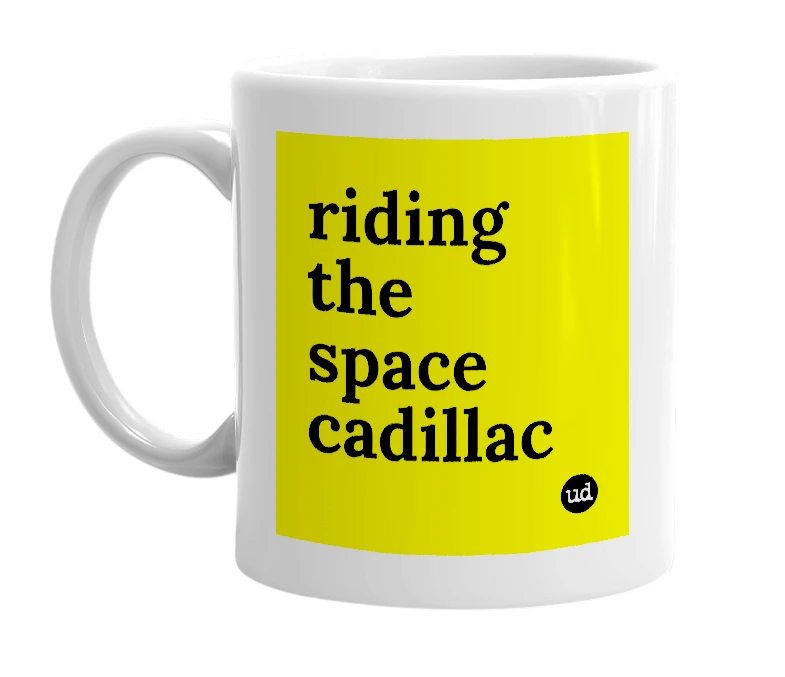 White mug with 'riding the space cadillac' in bold black letters