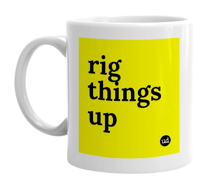 White mug with 'rig things up' in bold black letters