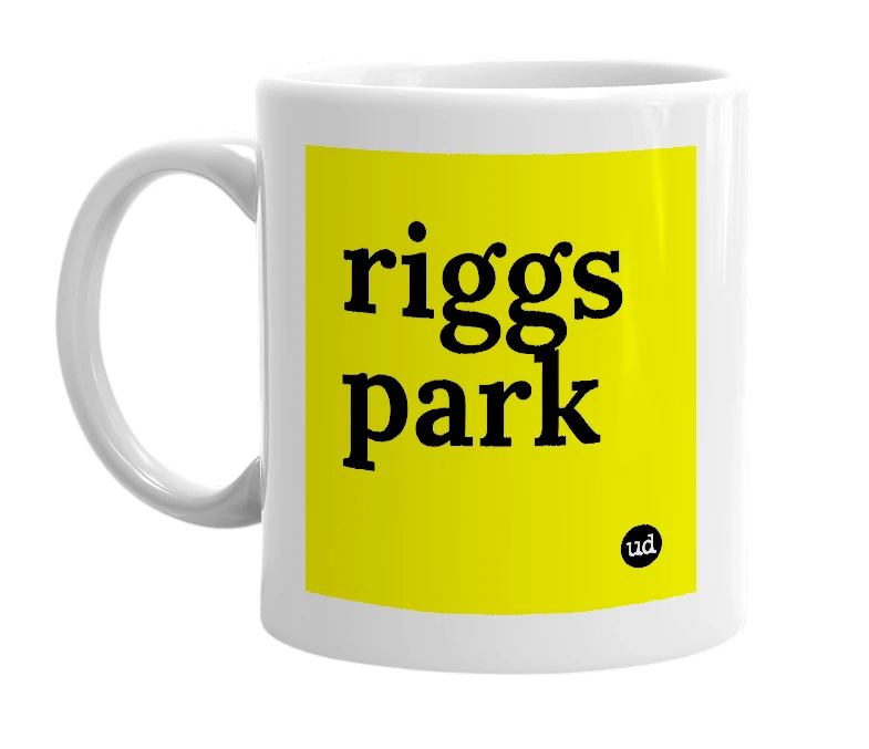 White mug with 'riggs park' in bold black letters