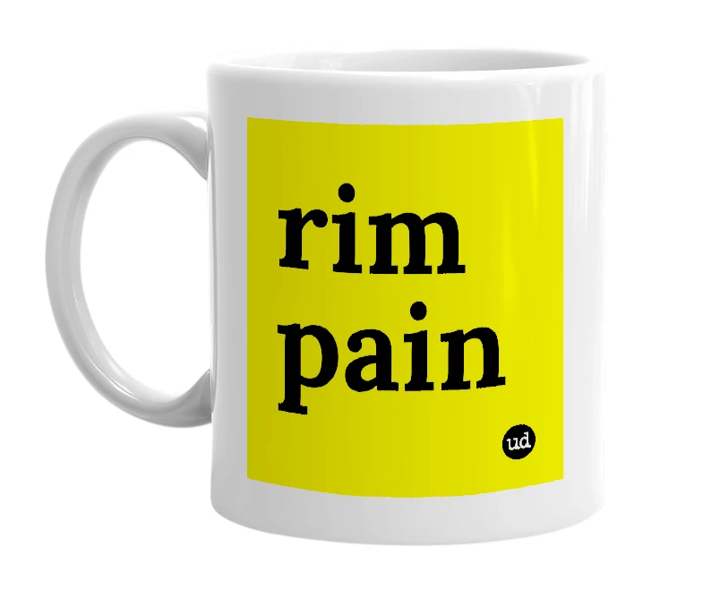 White mug with 'rim pain' in bold black letters