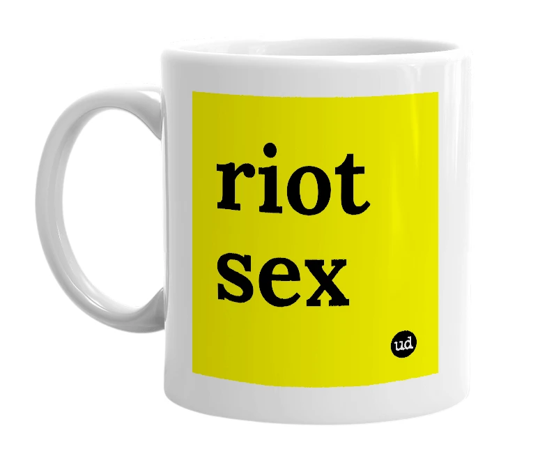 White mug with 'riot sex' in bold black letters