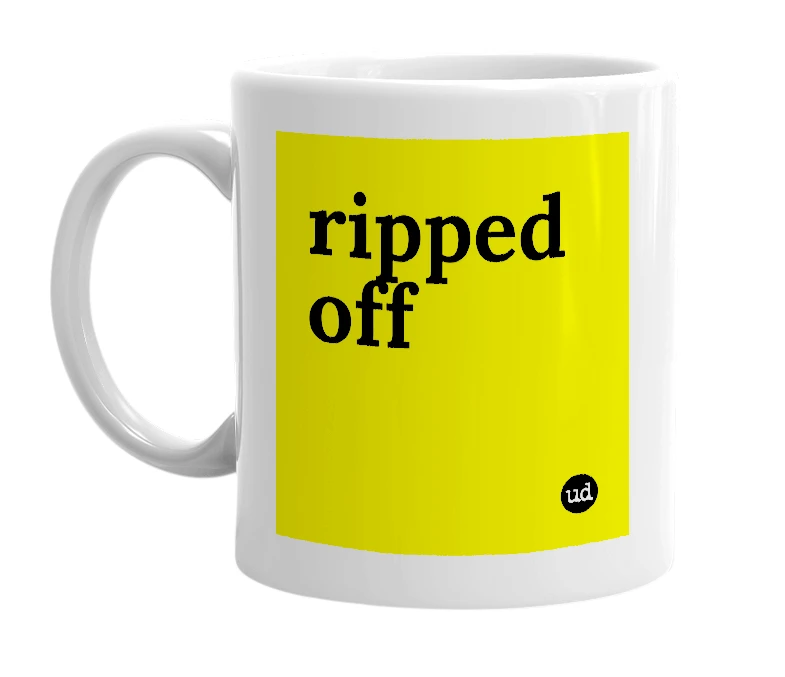 White mug with 'ripped off' in bold black letters