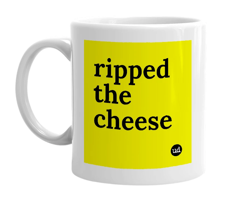 White mug with 'ripped the cheese' in bold black letters