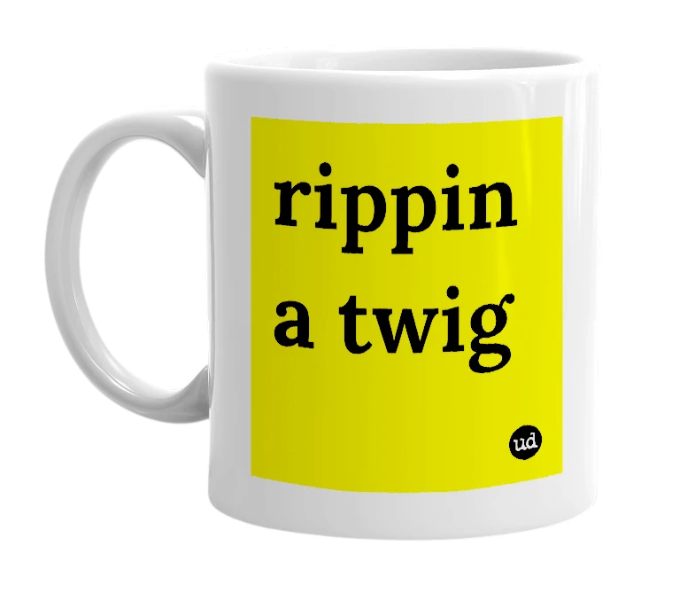 White mug with 'rippin a twig' in bold black letters