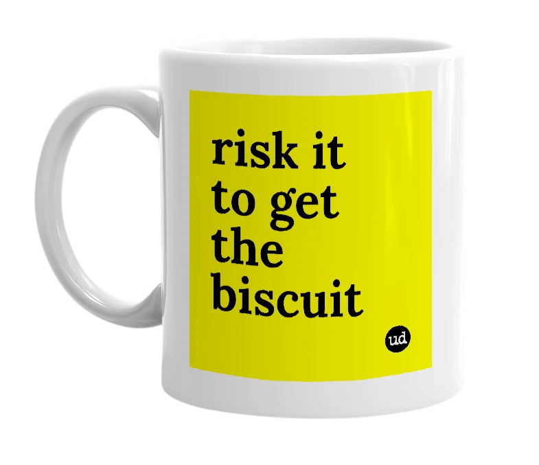 White mug with 'risk it to get the biscuit' in bold black letters