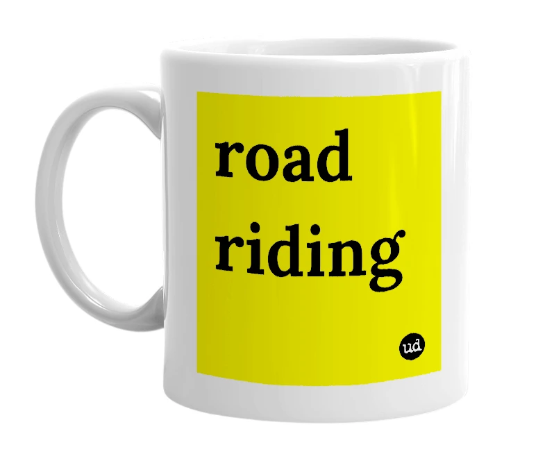 White mug with 'road riding' in bold black letters