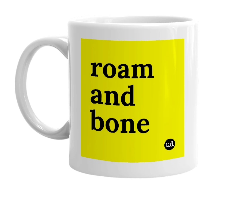 White mug with 'roam and bone' in bold black letters