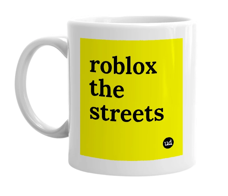 White mug with 'roblox the streets' in bold black letters