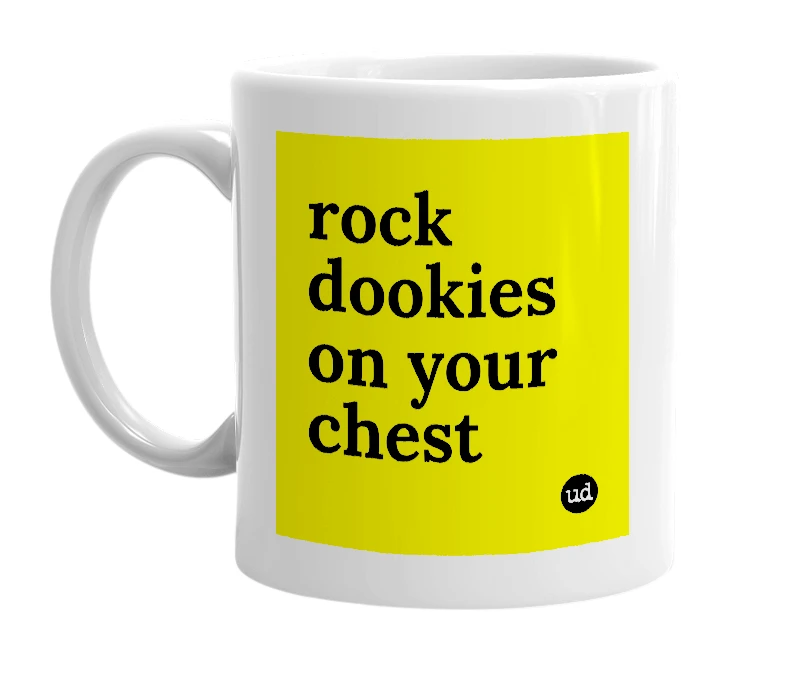 White mug with 'rock dookies on your chest' in bold black letters