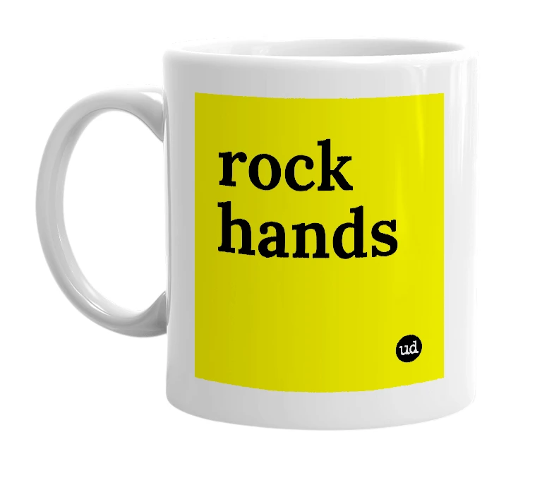 White mug with 'rock hands' in bold black letters